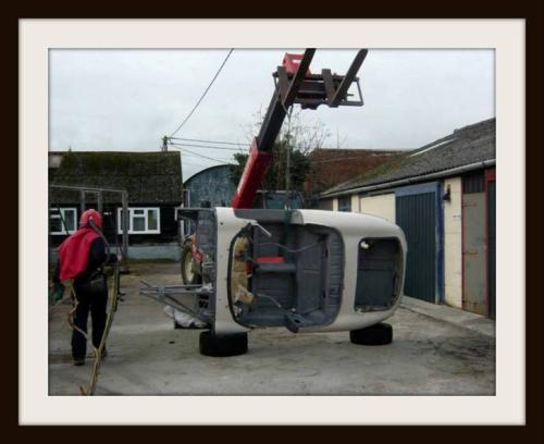 E type being loaded for transportation by customer